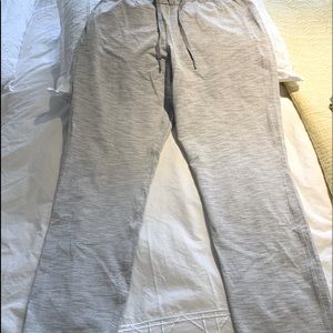 Lululemon,Fly away grey and white long travel pants with pockets.
